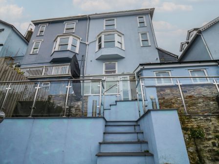 A house with stairs and a balcony at 58A South Ford Road, Dartmouth