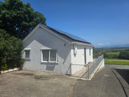 A house with solar panels in Bethel