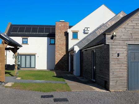 A house with solar panels and garden at The Newland in Morpeth