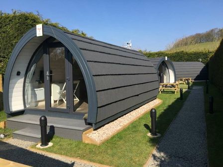 Two pods with outdoor seating area at Pod 3 (No Pets) in Carnforth