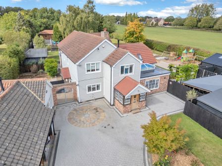 A house with a driveway and garden at Oldfields Spa Mansion with Pool, Sauna and Hot Tub in Bury St Edmunds