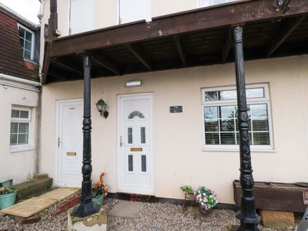 Front entrance with two doors and a light fixture at Tooth Suite Yarm