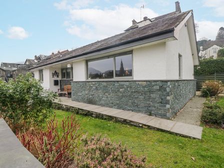 An exterior view of a house with a garden at Ambwray in Ambleside