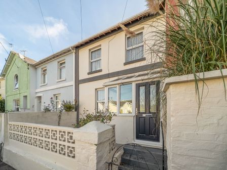 A house with a black door and windows at Torquay - House - Sleeps 6 - Pet Friendly, Torquay