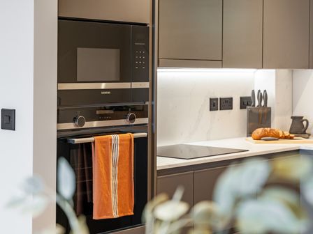 A kitchen with an oven and a towel at tbc in St. Ives