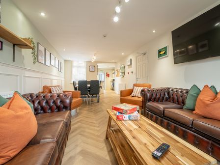 A living room with sofas and a coffee table at The Ravines in Scarborough