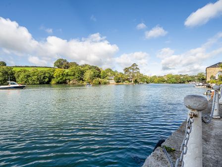 A view of water with boats and trees at Apartment Sleeps 4 with Balcony and Parking in Kingsbridge