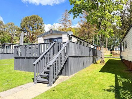 A caravan with steps leading up to it at Lillardsedge Luxury Caravan Sleeps 6 with Parking near Lilliardsedge Holiday Park