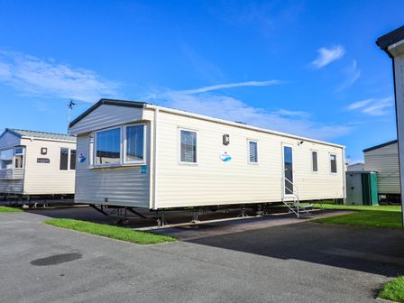 A caravan with steps outside at Beach Fields 45 Kinmel Bay