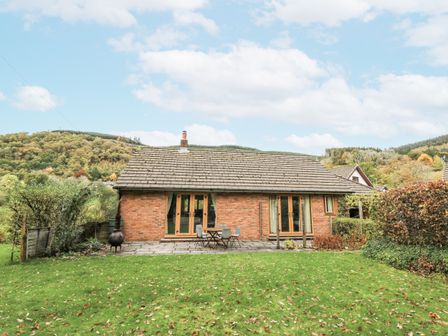 A house with a patio and garden at Geryllan Rhandirmwyn near Llandovery