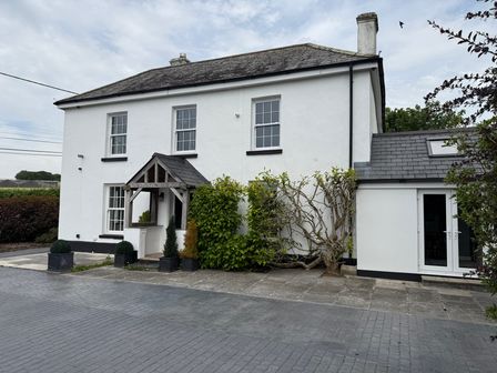 A house with a pathway and plants at Penlaurel in Launceston