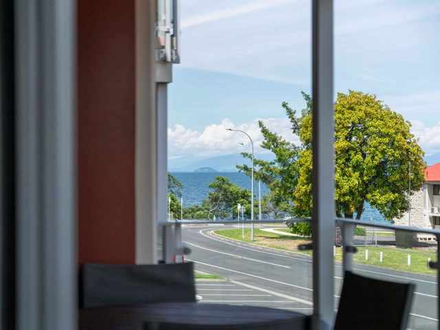 A view of the ocean from a window at Taupo Vista - Taupo Central