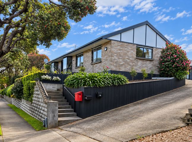 A house with stairs and mailboxes at Gallery Grove - New Plymouth Holiday Home, New Plymouth