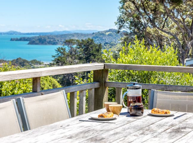 A table set with coffee and pastries at Island View Oneroa - Waiheke Holiday Home Waiheke Island