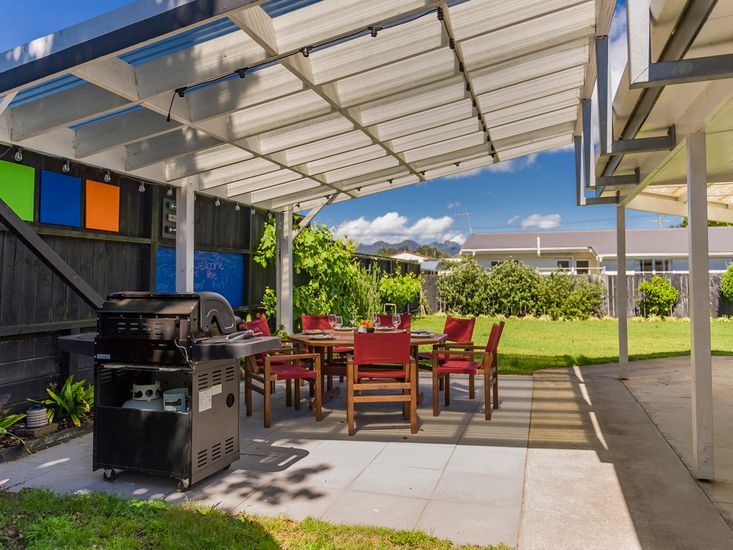 Sheltered dedicated BBQ and outdoor dining space!