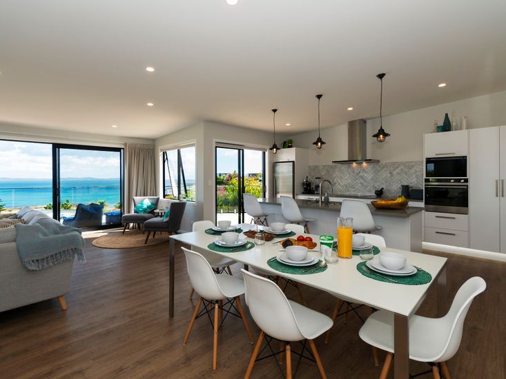 Dining table onto kitchen and views