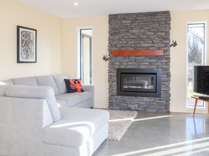 Comfy lounge area around fireplace