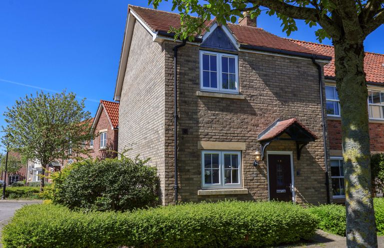 A house with windows and door at Driftwood in Filey