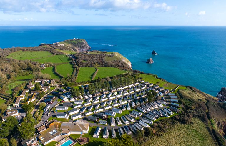 An aerial view of a holiday park near the coast at Chalet 34 at Landscove Holiday Park, Brixham