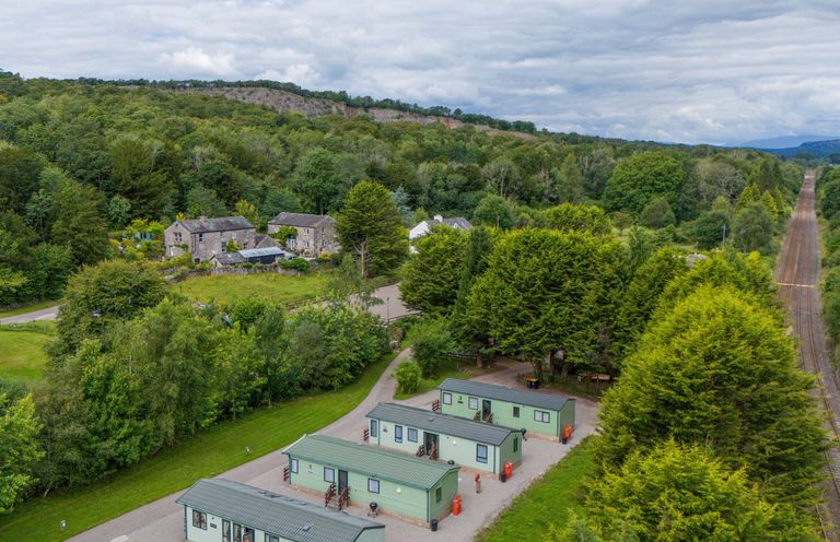 An aerial view of cabins and greenery at Lodge 1 Silverdale