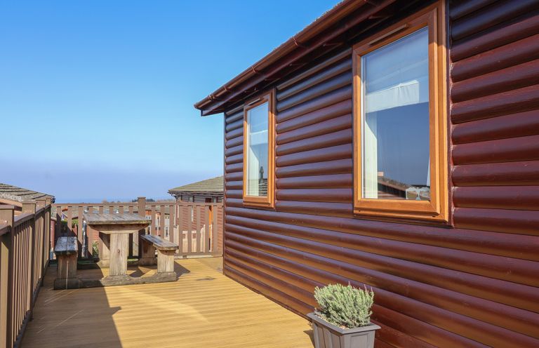 An outdoor space with a table and chairs at Ocean Terrace 28 Mullacott Ilfracombe