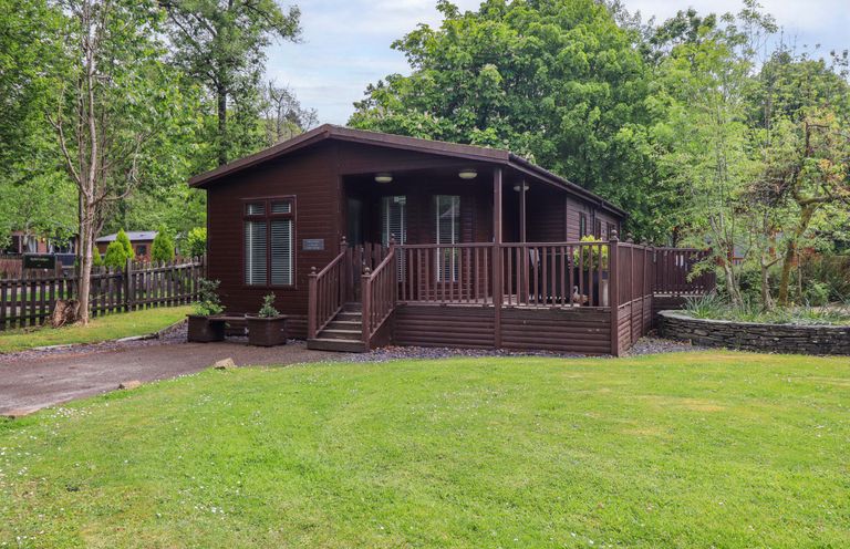 A cabin with deck and garden at Costapacket, Grasmere 12, White Cross Bay near Windermere