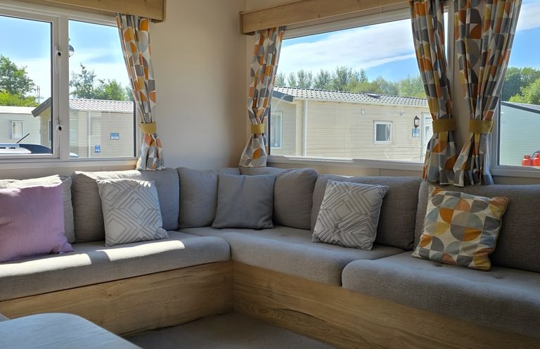 A living room with seating area at Caravan