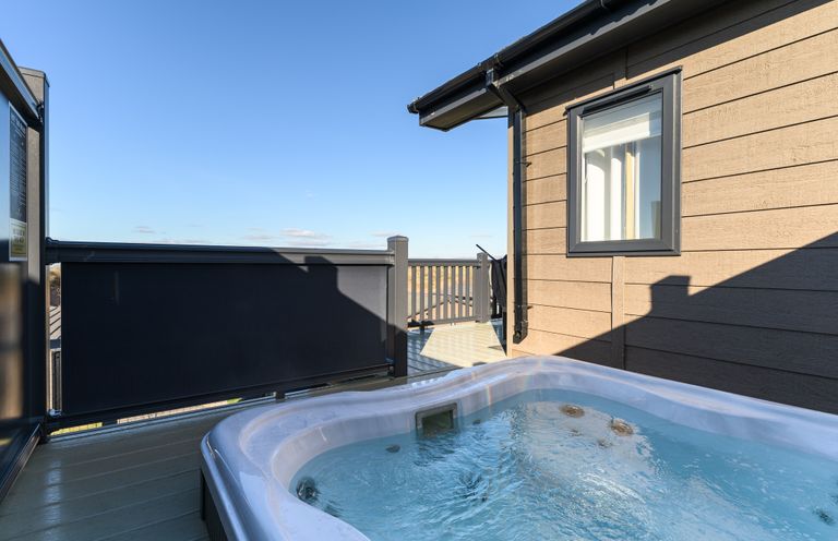 A hot tub on a deck at Keswick (Pet) Penrith