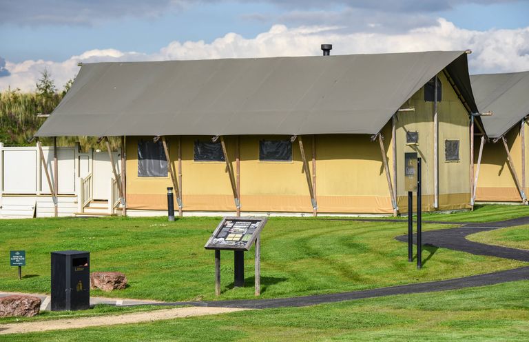 A tent with a pathway and sign at Savannah (Pet) Penrith