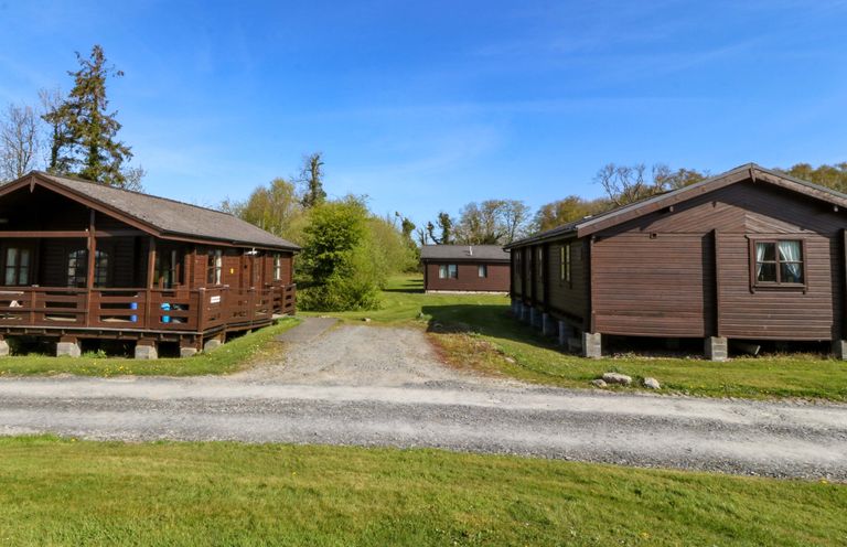 A view of cabins and pathway at Lodge 6 - Sleep 4 - Twin and Double in Criccieth