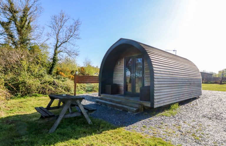 A pod with a picnic table at Bron Eifion Pod 3 Criccieth
