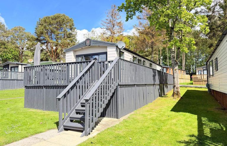 A caravan with steps leading up to it at Lillardsedge Luxury Caravan Sleeps 6 with Parking near Lilliardsedge Holiday Park