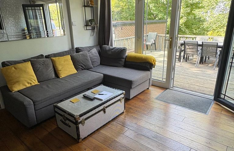 A living room with a sofa and coffee table at Pet Friendly 2-Bed Lodge, Sleeps 5, Pool & Parking, Caernarfon